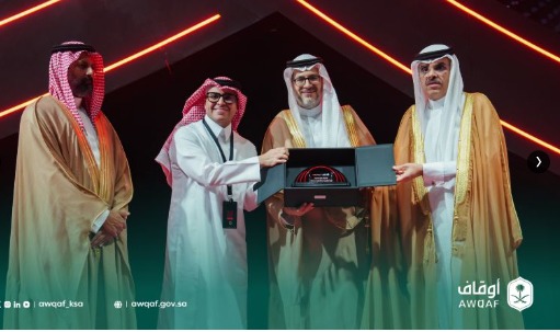 Receiving recognition at the Awqaf (AWQAF) ceremony